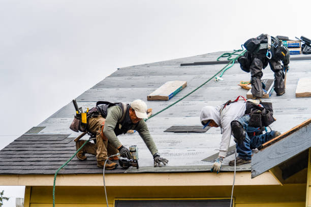 Professional Roof Replacement technician working in Sixes, OR